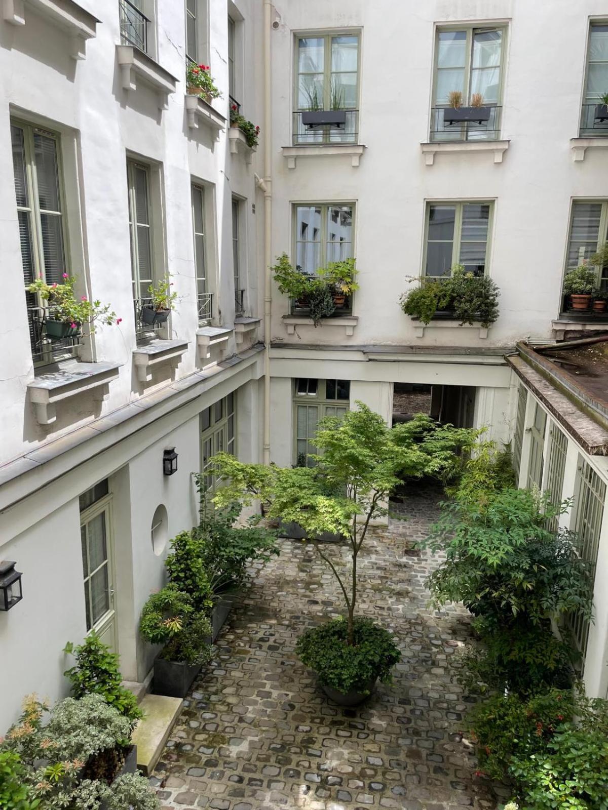 Appartamento 4 Pieces Charme Paris Centre Esterno foto